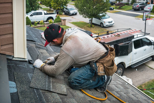 Professional Flat Roof Repair technician working in Swiss, WV